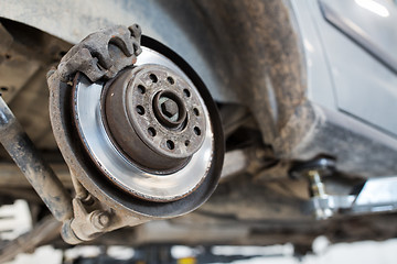 Image showing car brake disc at repair station