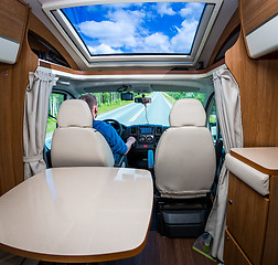 Image showing Man driving on a road in the Camper Van