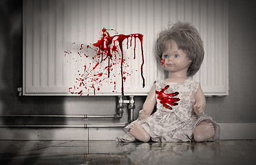 Image showing Concept of child abuse - Bloody doll