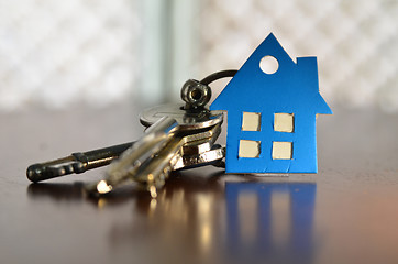 Image showing Bunch of keys with house shaped cardboard