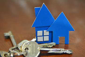 Image showing Bunch of keys with house shaped cardboard