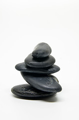 Image showing  Five black stones balanced isolated 