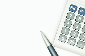 Image showing Calculator and pen isolated on white