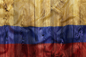 Image showing National flag of Colombia, wooden background