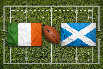Image showing Ireland vs. Scotland\r\rIreland vs. Scotland flags on rugby field