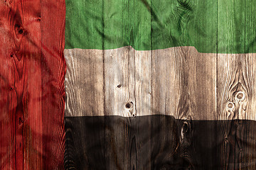 Image showing National flag of United Arab Emirates, wooden background