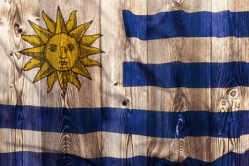 Image showing National flag of Uruguay, wooden background