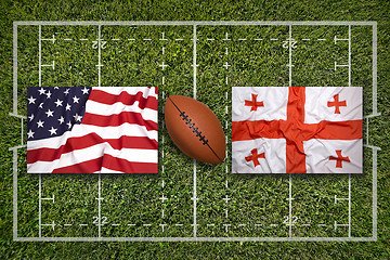 Image showing USA vs. Georgia flags on rugby field