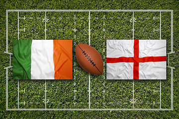 Image showing Ireland vs. Scotland\r\rIreland vs. England flags on rugby field