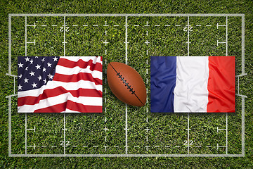 Image showing USA vs. France flags on rugby field