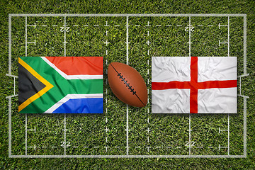 Image showing South Africa vs. England flags on rugby field