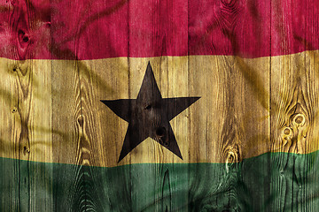 Image showing National flag of Ghana, wooden background