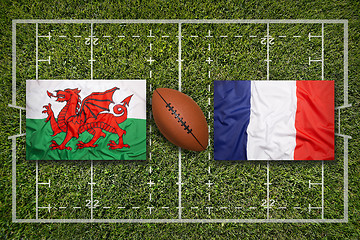 Image showing Wales vs. France flags on rugby field
