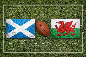 Image showing Scotland vs. Wales\r flags on rugby field