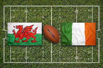 Image showing Wales vs. Ireland flags on rugby field