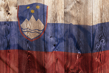 Image showing National flag of Slovenia, wooden background