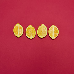 Image showing Lemons on red background