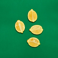 Image showing Lemons on green background