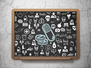 Image showing Healthcare concept: Pills on School board background