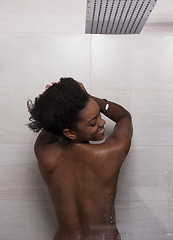 Image showing African American woman in the shower