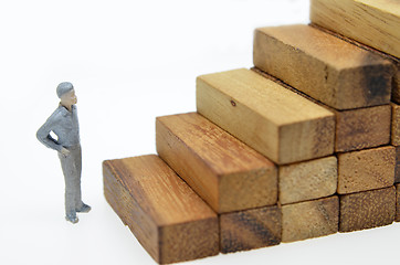 Image showing Way to success with  businessman and wood block step