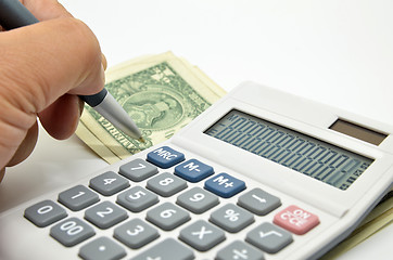 Image showing Calculator, money and pen isolated on white