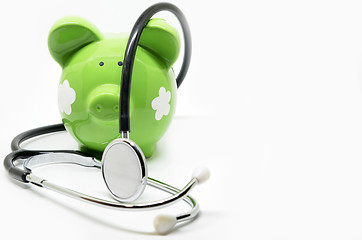 Image showing Piggy bank and stethoscope 