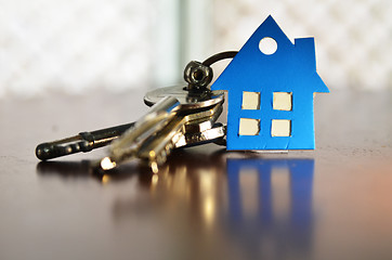 Image showing Bunch of keys with house shaped cardboard