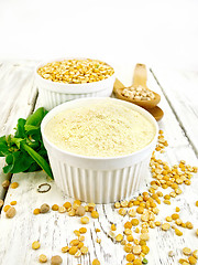 Image showing Flour pea and split pease in white bowls on light board