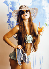 Image showing cute bright woman in sunglasses and hat with cocktail in bikini 