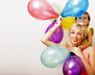 Image showing pretty real family with color balloons on white background, blon