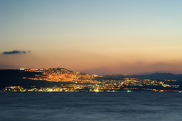 Image showing Lake Kinneret on the Sunset and the lights of Tiberias