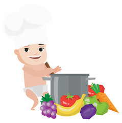 Image showing Baby in chef hat cooking healthy meal.