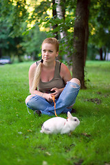 Image showing girl with white rabbit