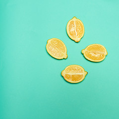 Image showing Lemons on green background