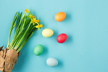 Image showing The top view of easter on blue table office workplace