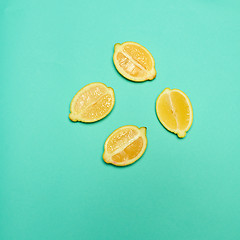 Image showing Lemons on green background