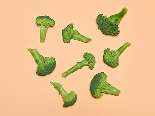 Image showing The fresh broccoli on pink background