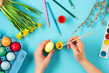 Image showing The top view of easter on blue table office workplace