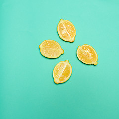 Image showing Lemons on green background