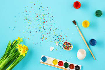 Image showing The top view of easter on blue table office workplace