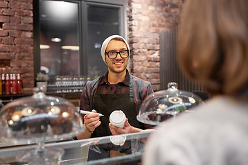 Image showing man or barman with coffee cup and customer at cafe