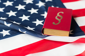 Image showing close up of american flag and lawbook