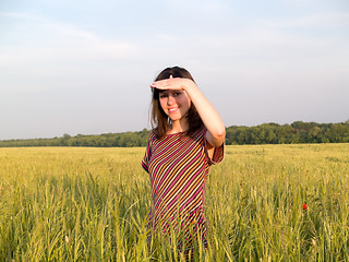 Image showing Beautiful Teen Lady Looks in Field