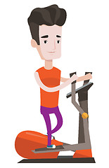 Image showing Man exercising on elliptical trainer.