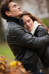 Image showing Autumn portrait of attractive happy couple