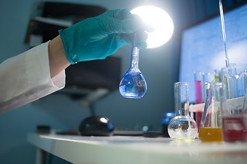 Image showing Lab table with test tubes