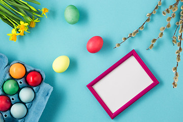 Image showing The top view of easter on blue table office workplace