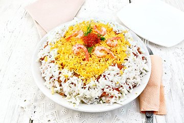 Image showing Salad of salmon and seafood on light table