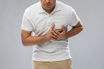 Image showing close up of man suffering from heart ache